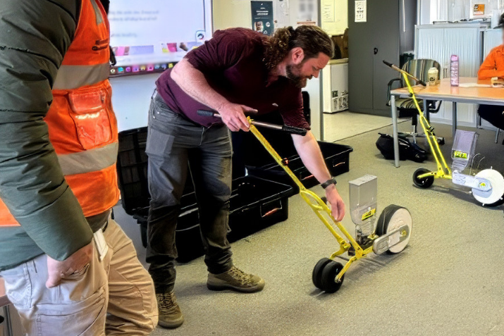 Man demonstrating the cropping applicator