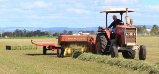Tracker baling hay