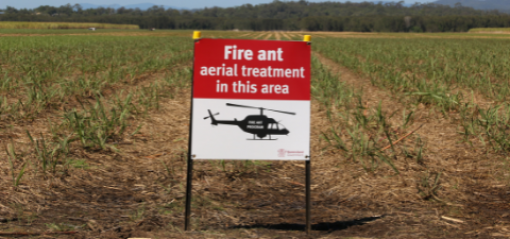 Sign showing aerial fire ant treatment is being carried out