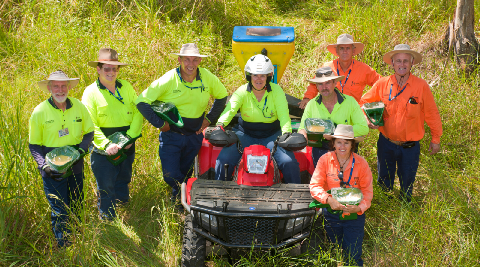 Program staff, quad bike, bush, treating fire ants banner image