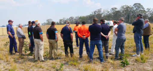 pest manager training in open grass field